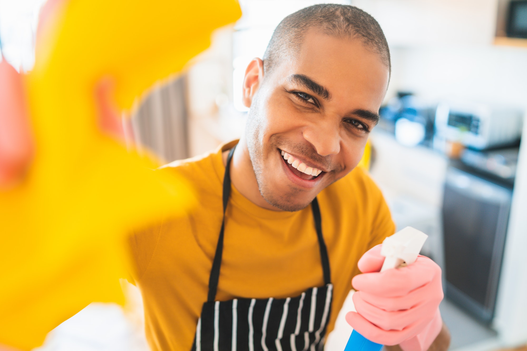 latin-man-cleaning-new-home-.jpg